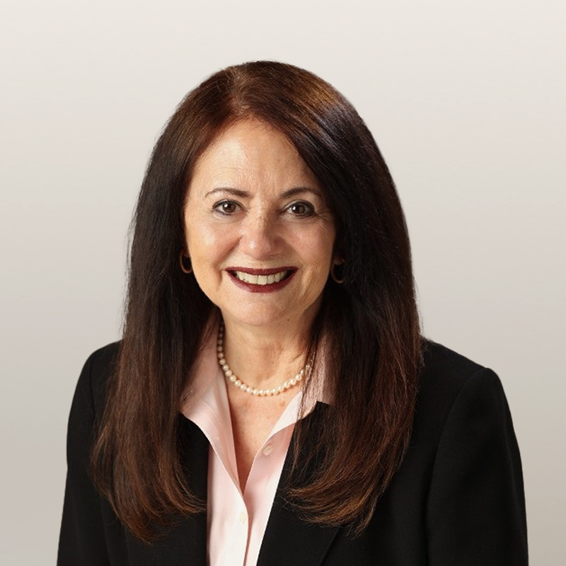 Maria Nigro smiling in studio portrait